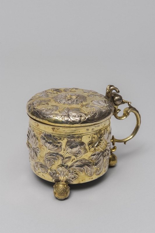 Tankard with floral decor