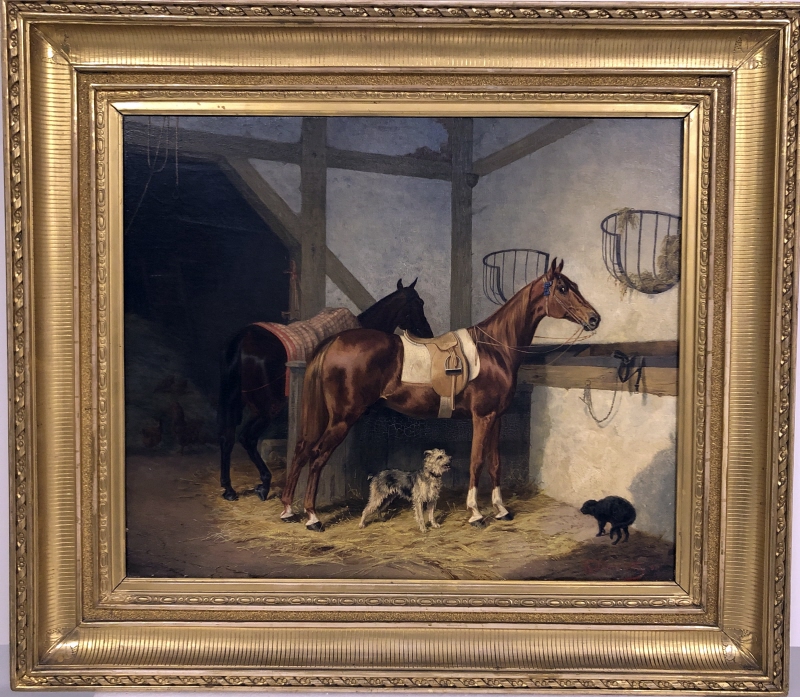 Hästar i ett stall