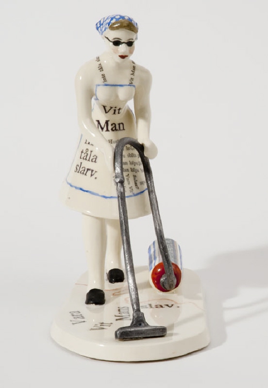 Figurine ”Vacuum Cleaning Lady”