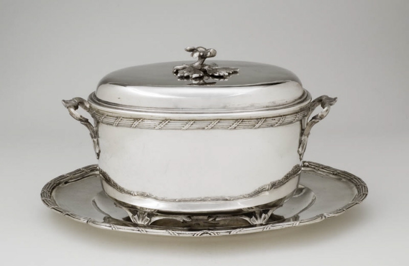 Turrine with lid, standing on a platter