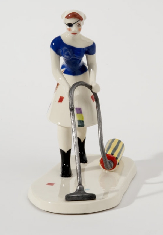 Figurine ”Vacuum Cleaning Lady”