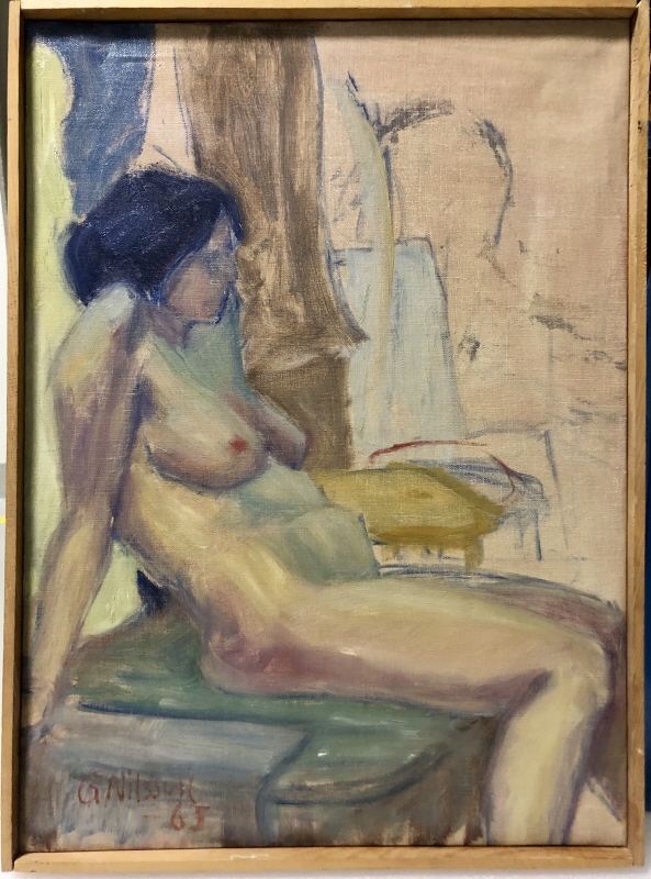 Sittande naken kvinna