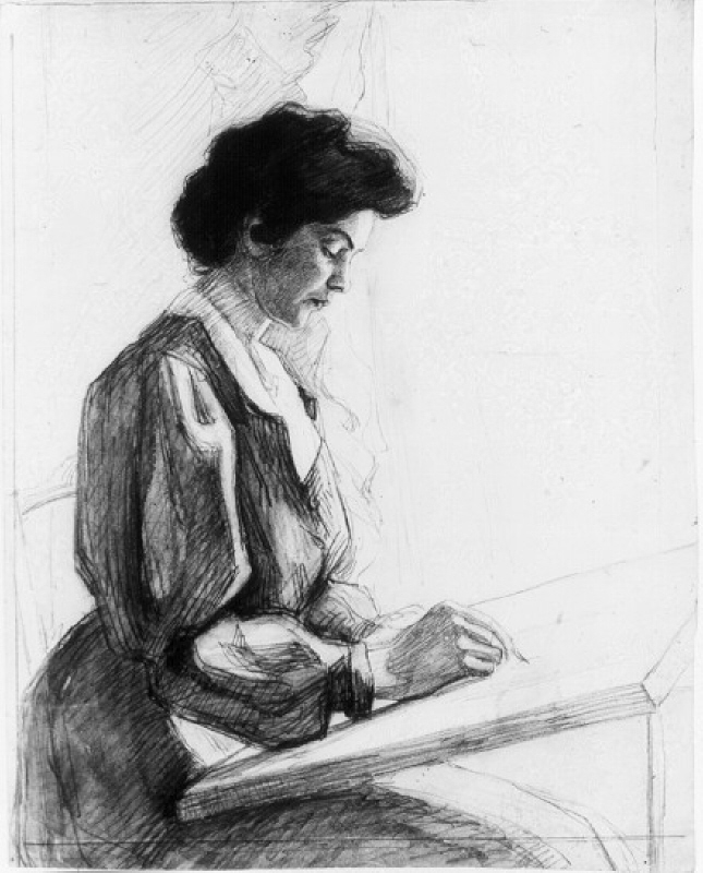 Kvinna som sitter och tecknar