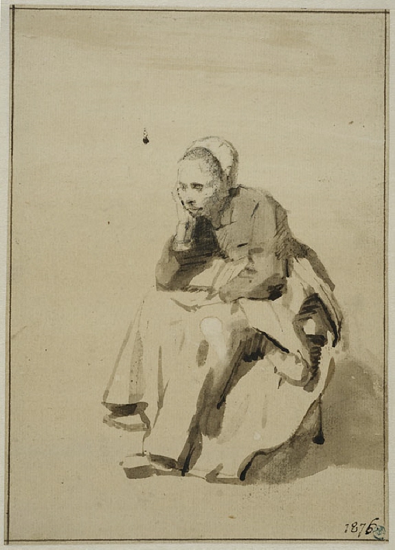 Sittande kvinna med huvudet i handen