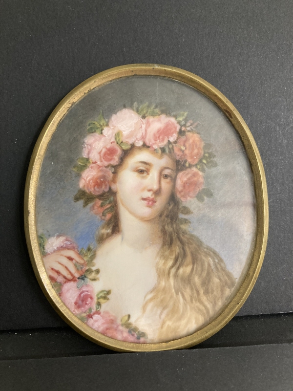 Ung kvinna med rosor